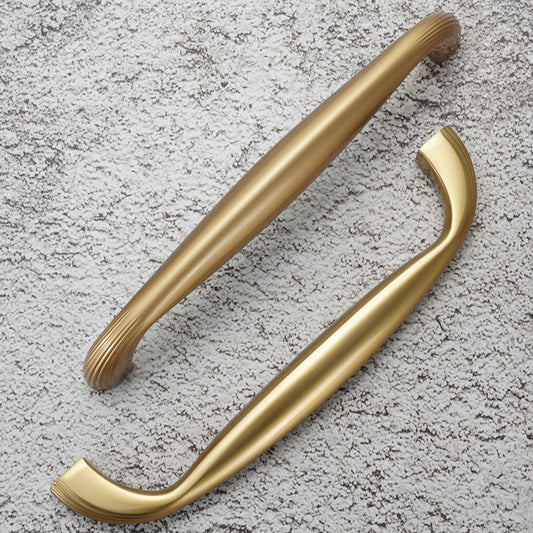 Close-up of Gold Drawer Knobs - Gold finish on zinc alloy with modern design details