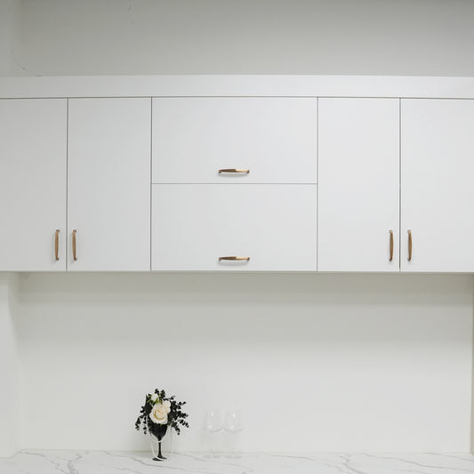 Zinc alloy brushed champagne bronze drawer pulls with smooth finish.