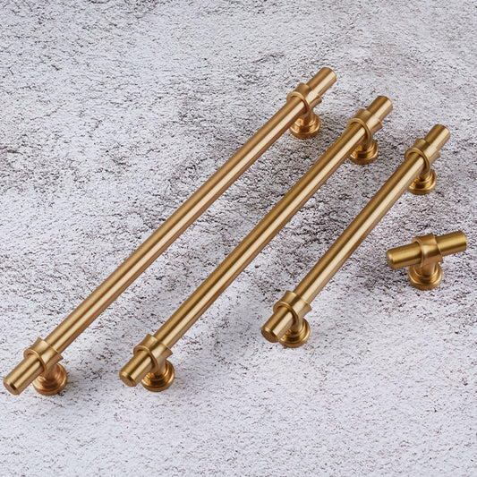 Set of three Champagne Bronze Cabinet Handles showcasing a modern T-bar design on textured surface.