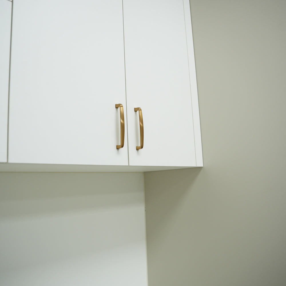Brushed champagne bronze cabinet handle with 96mm hole spacing.