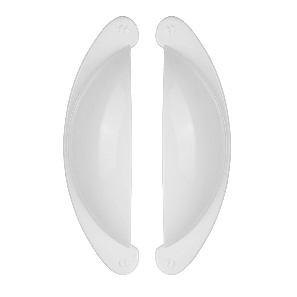 Half round drawer pull handles installed on a wooden cabinet door