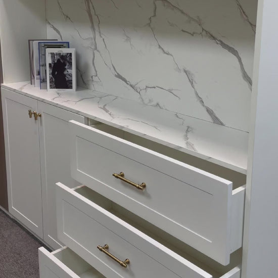 Champagne bronze cabinet handles installed on furniture, demonstrating smooth operation of drawers and cabinets with a modern home decor look