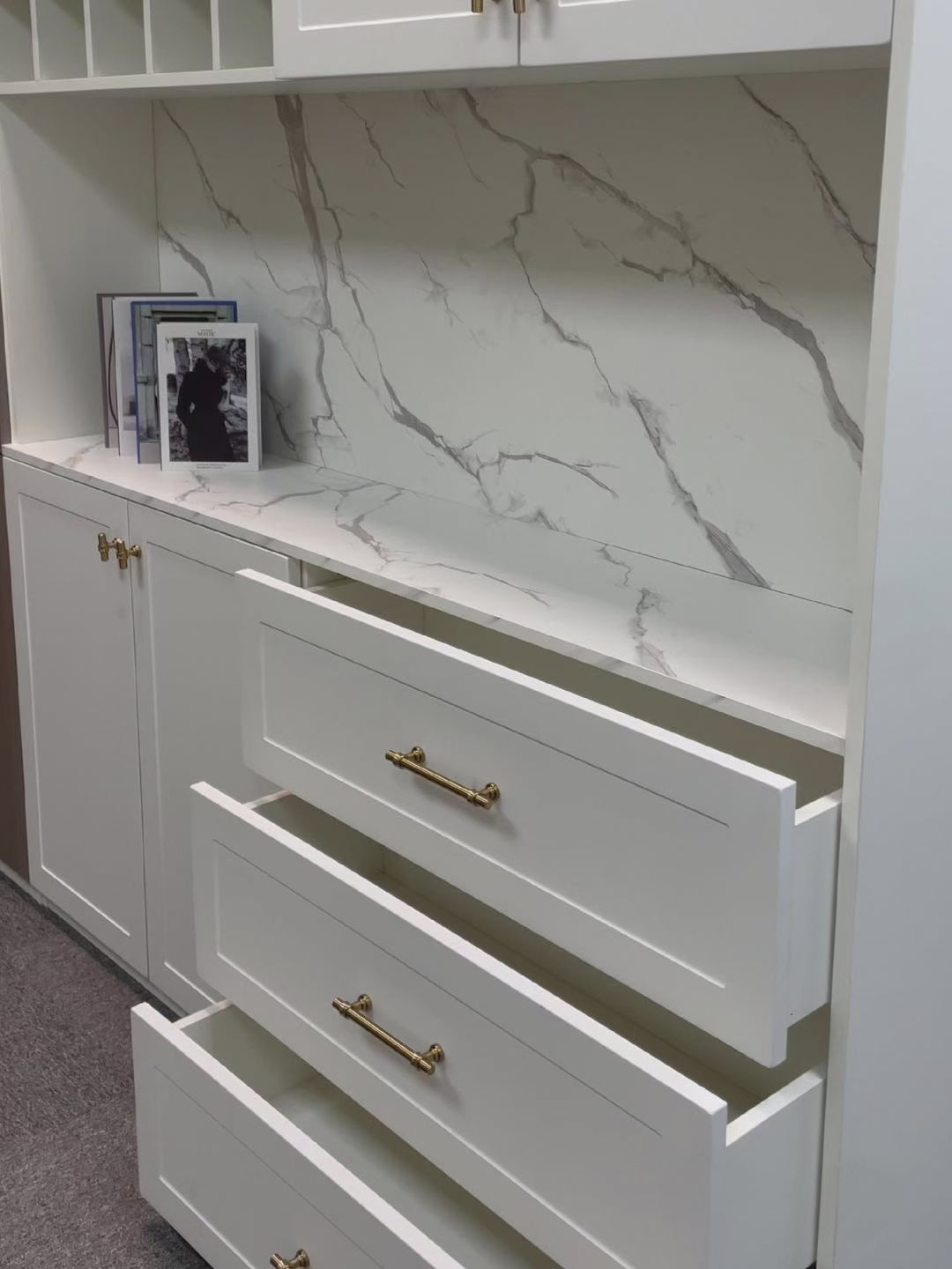 Champagne bronze cabinet handles installed on furniture, demonstrating smooth operation of drawers and cabinets with a modern home decor look