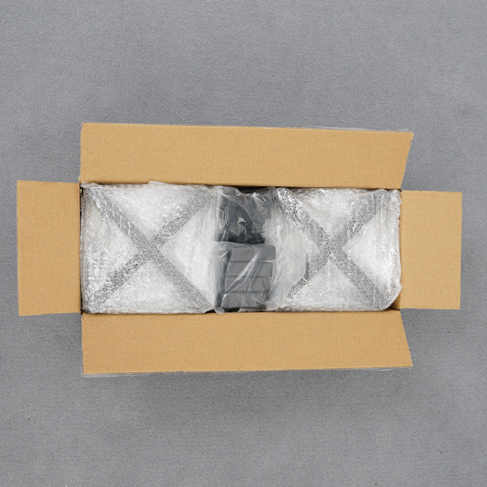 Rectangular packaging box 44x17x14cm opened, neatly packed and organized, secure and visually appealing for shipping or storage