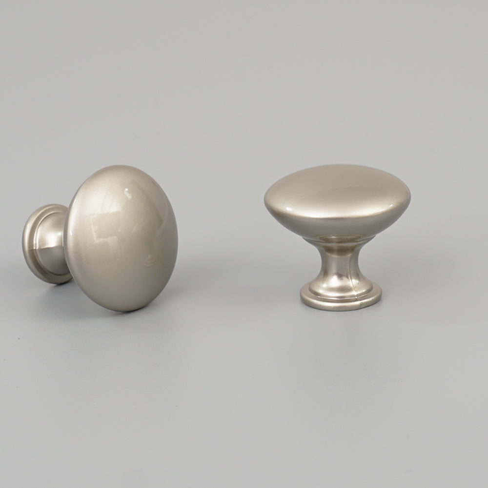 Zinc alloy single hole drawer pull handle installed on cabinet