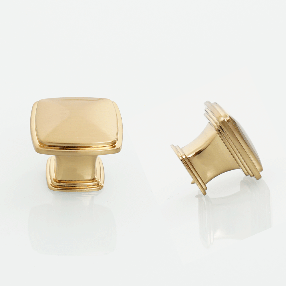 Stylish brushed champagne bronze cabinet pulls on wardrobe doors.